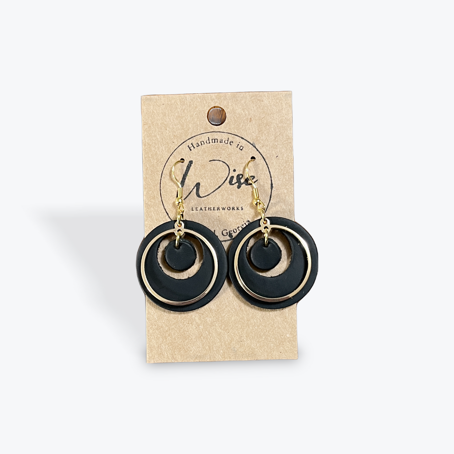 Black leather with gold colored access ring.
