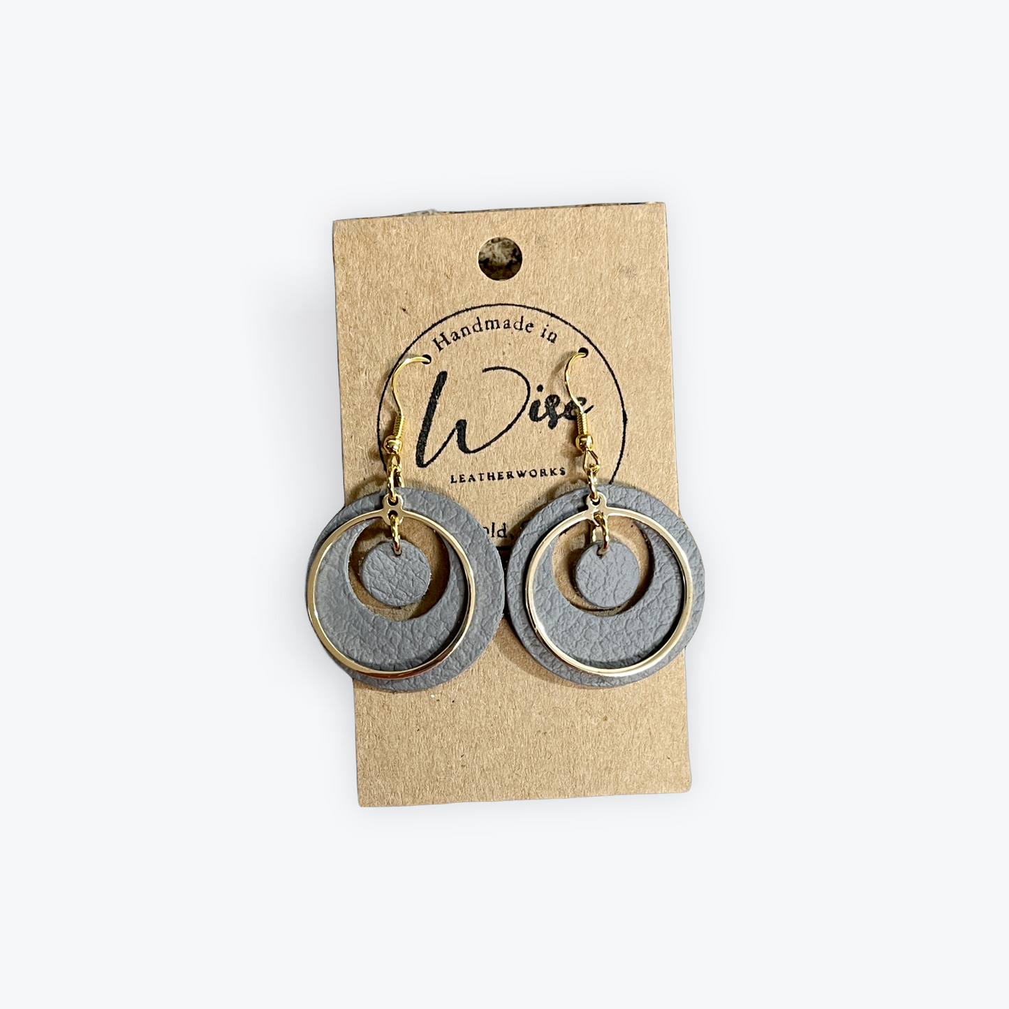 Gray leather with gold colored access ring.