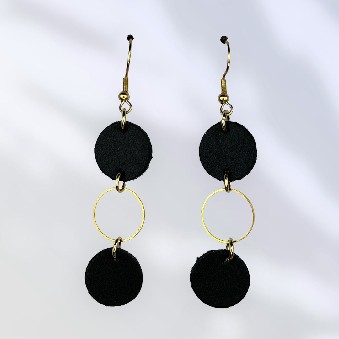 Black leather and gold accents dangle earrings