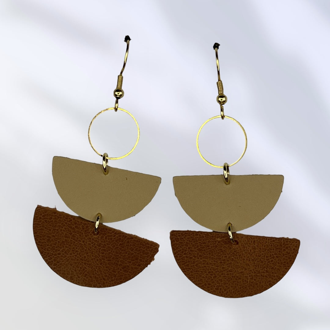 Brown and cream leather dangle earrings with gold colored accents