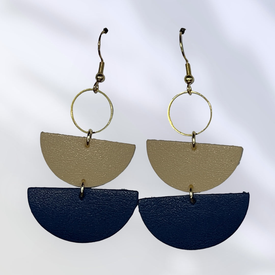 Navy and cream leather dangles earrings with gold colored accents