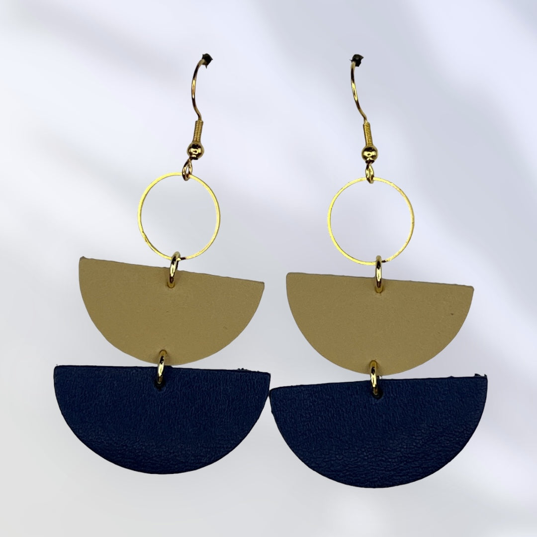 Navy and cream leather dangles earrings with gold colored accents
