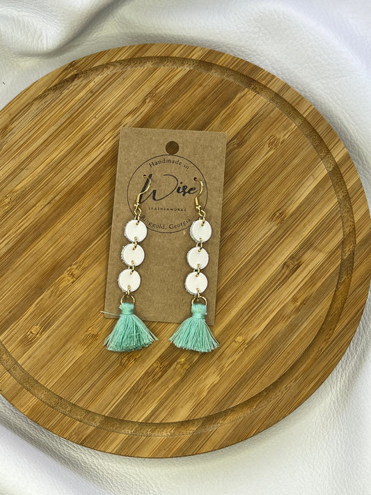 White leather dangle with turquoise tassel
