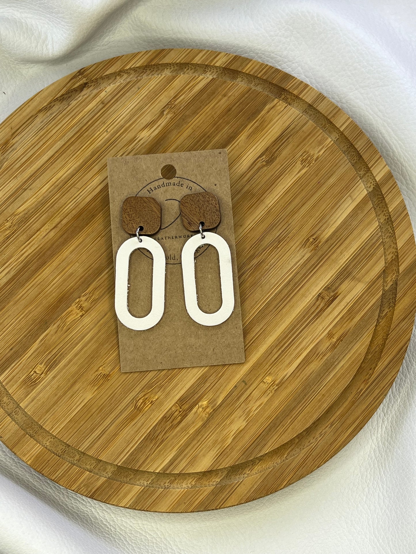 White Oval leather earrings with wood post