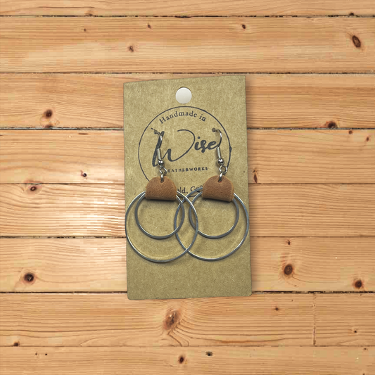 Double metal hoops with brown leather accent earrings. Metal is plain