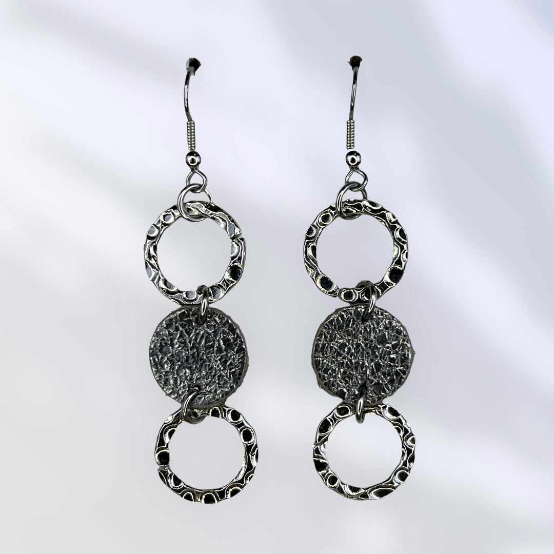 Silver leather with silver colored accent earrings